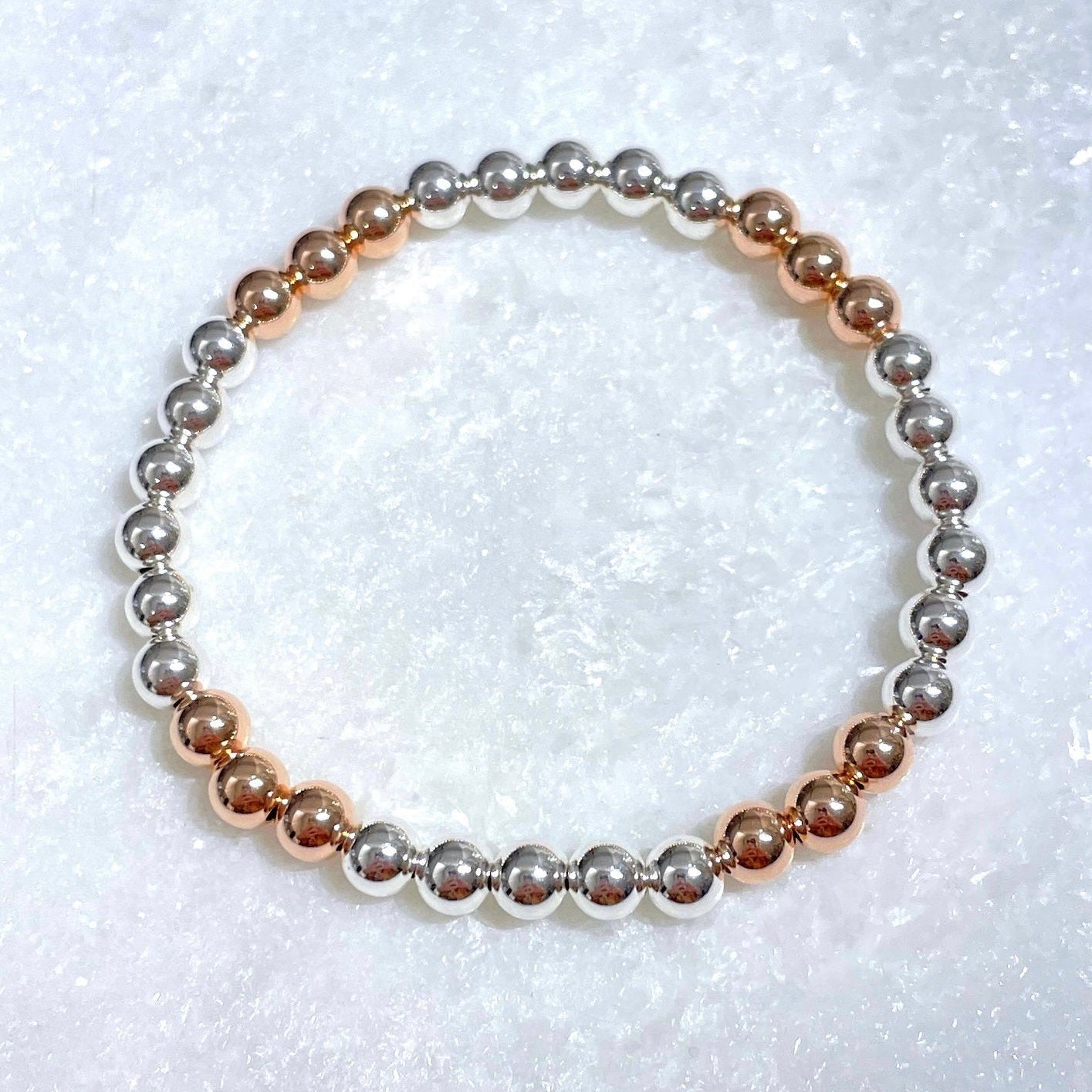 B450-SS Silver/Rose Gold Plated Stretch Bracelet