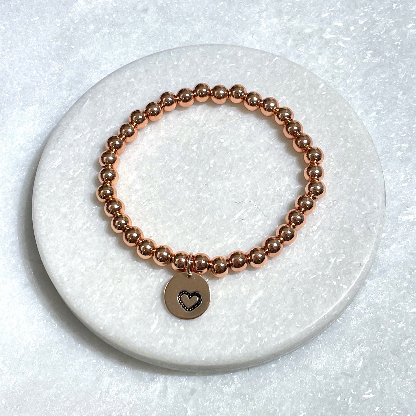 B112-RG - 6mm Rose Gold Plated/Heart Charm Stretch Bracelet