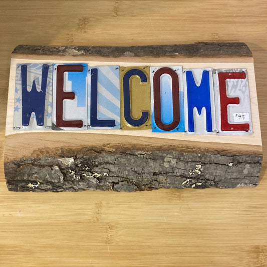 License Plate Welcome Sign on Live Edge Wood