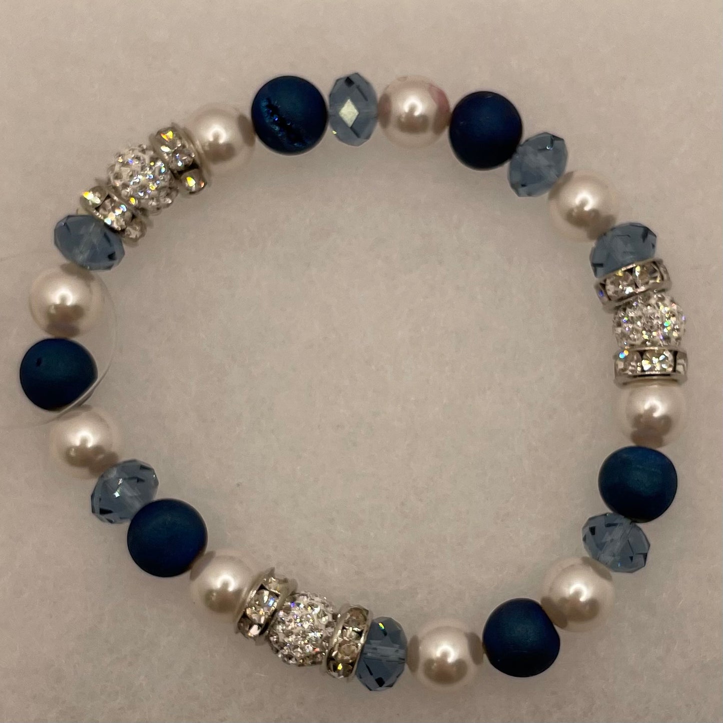 B180-SS Crystal Pave’ Ball & Blue Pearl Stretch Bracelet